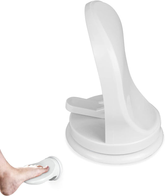 Suction cup shower foot rest mounted on bathroom wall for leg shaving and pedicures