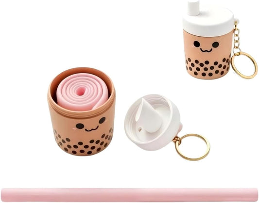 Reusable boba straw keychain with collapsible silicone straw and portable case clipped to a bag