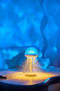 2-in-1 jellyfish lamp and ocean wave projector casting water ripple light on a ceiling