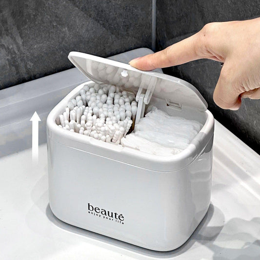 White pop-up cotton swab holder with 4 compartments mounted on bathroom wall