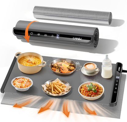 Electric food warming mat with temperature control and timer keeping dishes warm on a table