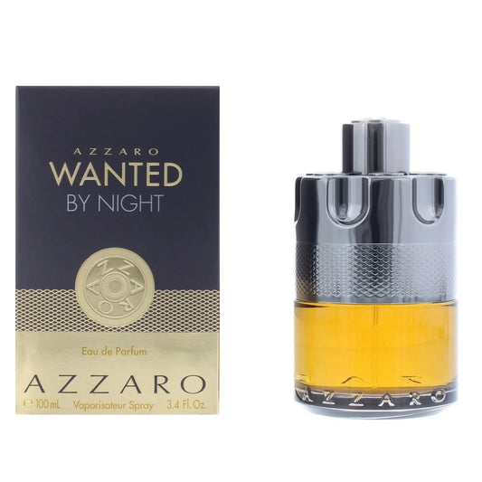 Azzaro Wanted By Night Eau de Parfum 100ml bottle and its dark navy and gold packaging box, displayed side-by-side on a white background.