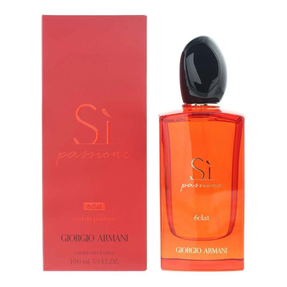 Giorgio Armani Si passion 4cl eau de parfum bottle and its red packaging box, featuring a vibrant orange-red liquid in a clear bottle with a glossy black cap, next to its red box.